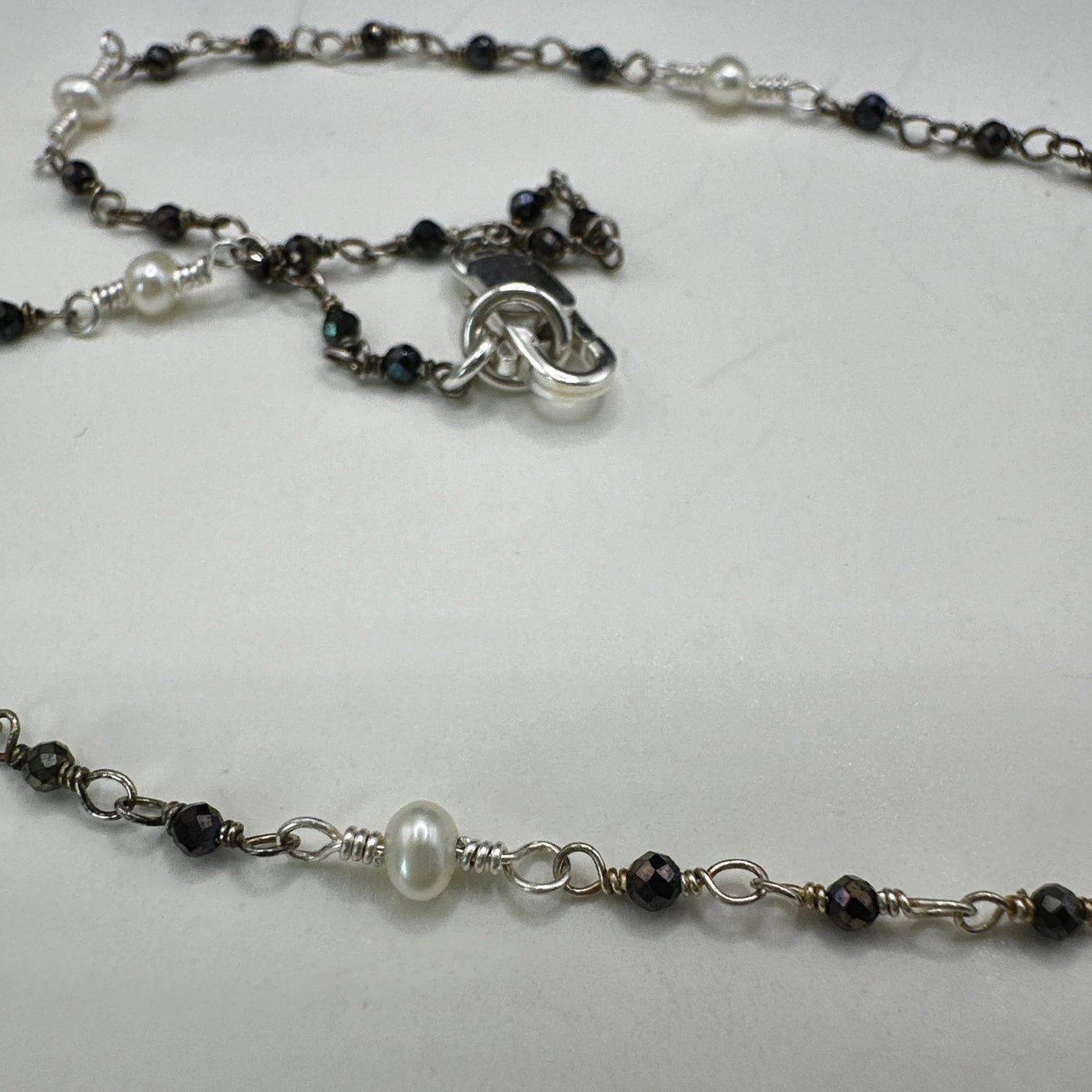 Oval freshwaterpearls and dark amethyst silver necklace