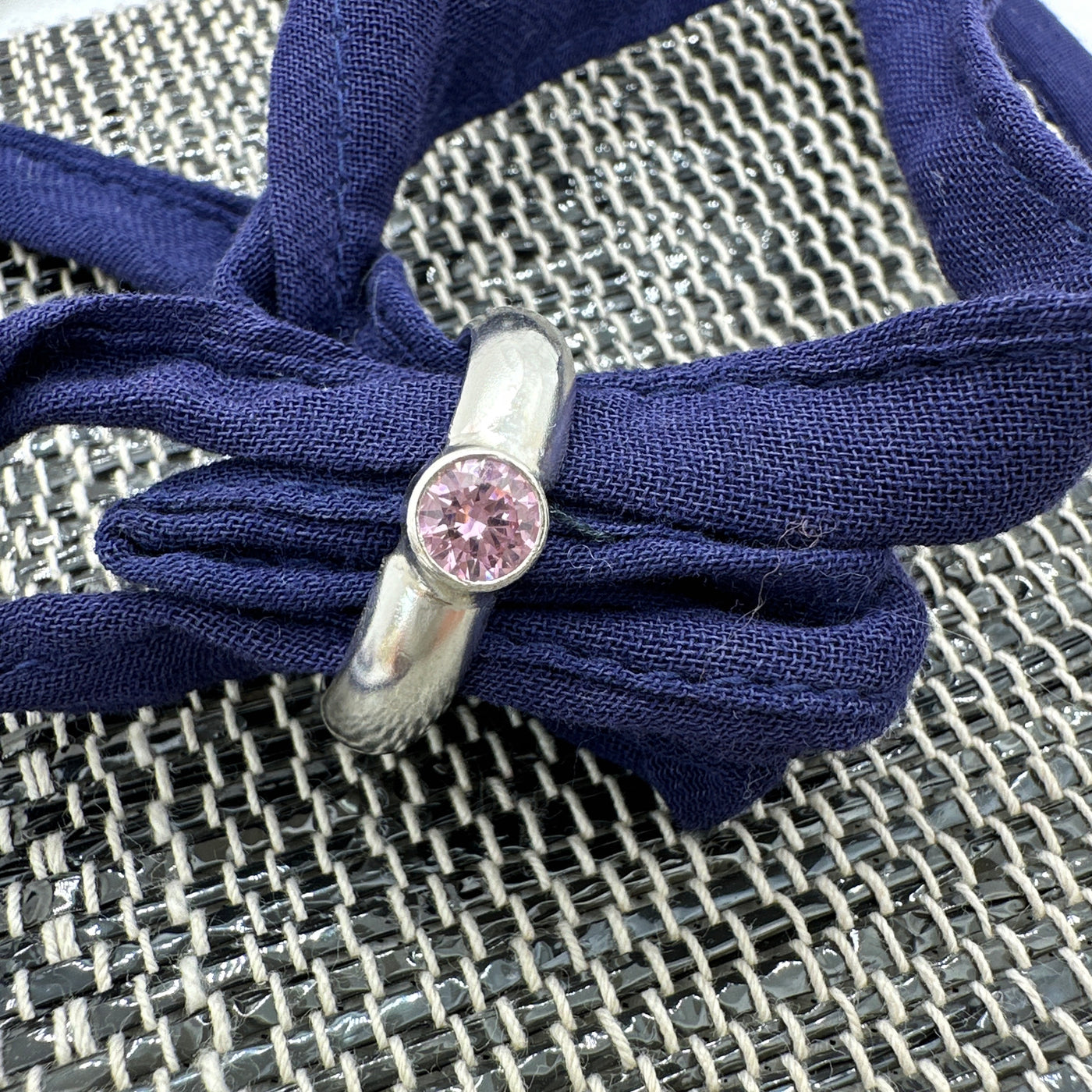 Pink zirconia and silver ring. size R