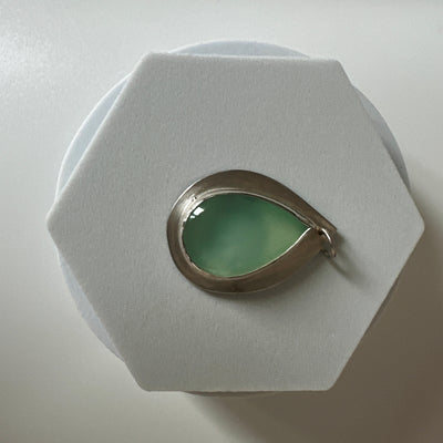Silver pendant with pear shaped green cabochon