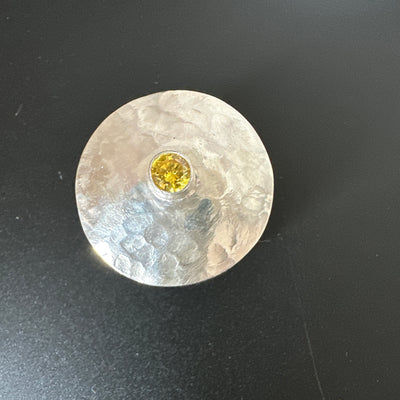 Silver box with yellow cubic zirconia
