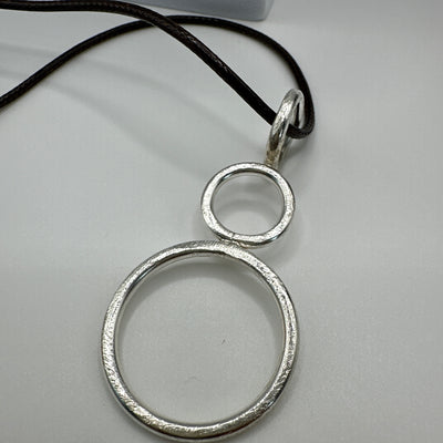 Sterling silver pendant circles hammered satin