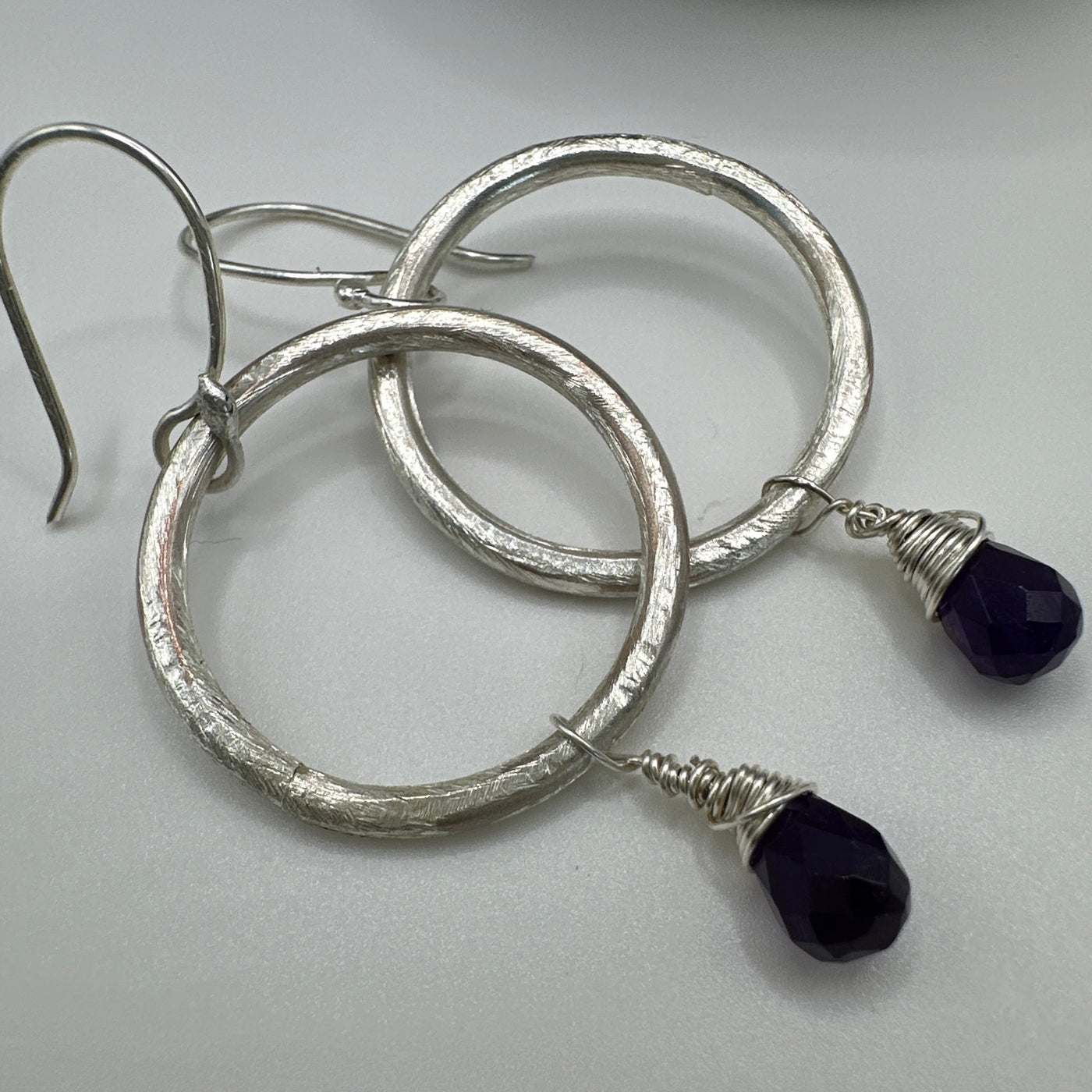 Silver round rings and amethyst briolette earrings