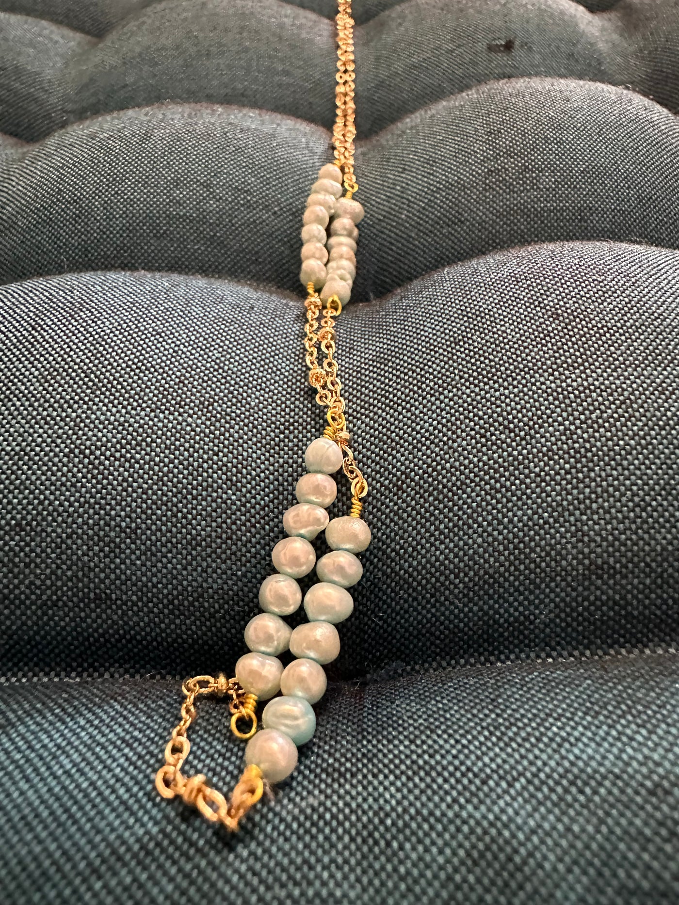 Necklace featuring freshwater pearls -light turquoise- on brass chain