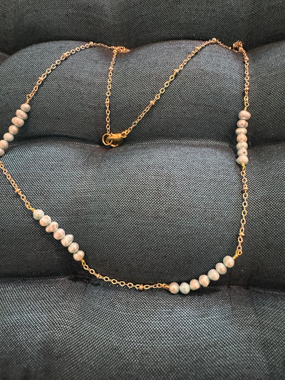 Necklace featuring freshwater pearls -light turquoise- on brass chain