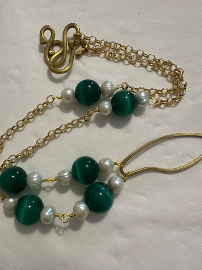 Necklace with bronze oval element, cat eye smerald pearls and freshwater pearls on  brass chain