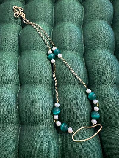 Necklace with bronze oval element, cat eye smerald pearls and freshwater pearls on  brass chain