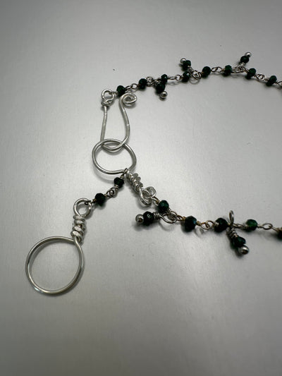 Silver and green beads with dangling green pendants bracelet