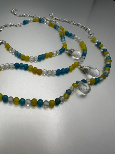 Stackable bracelets (yellow, blue and white pearls)