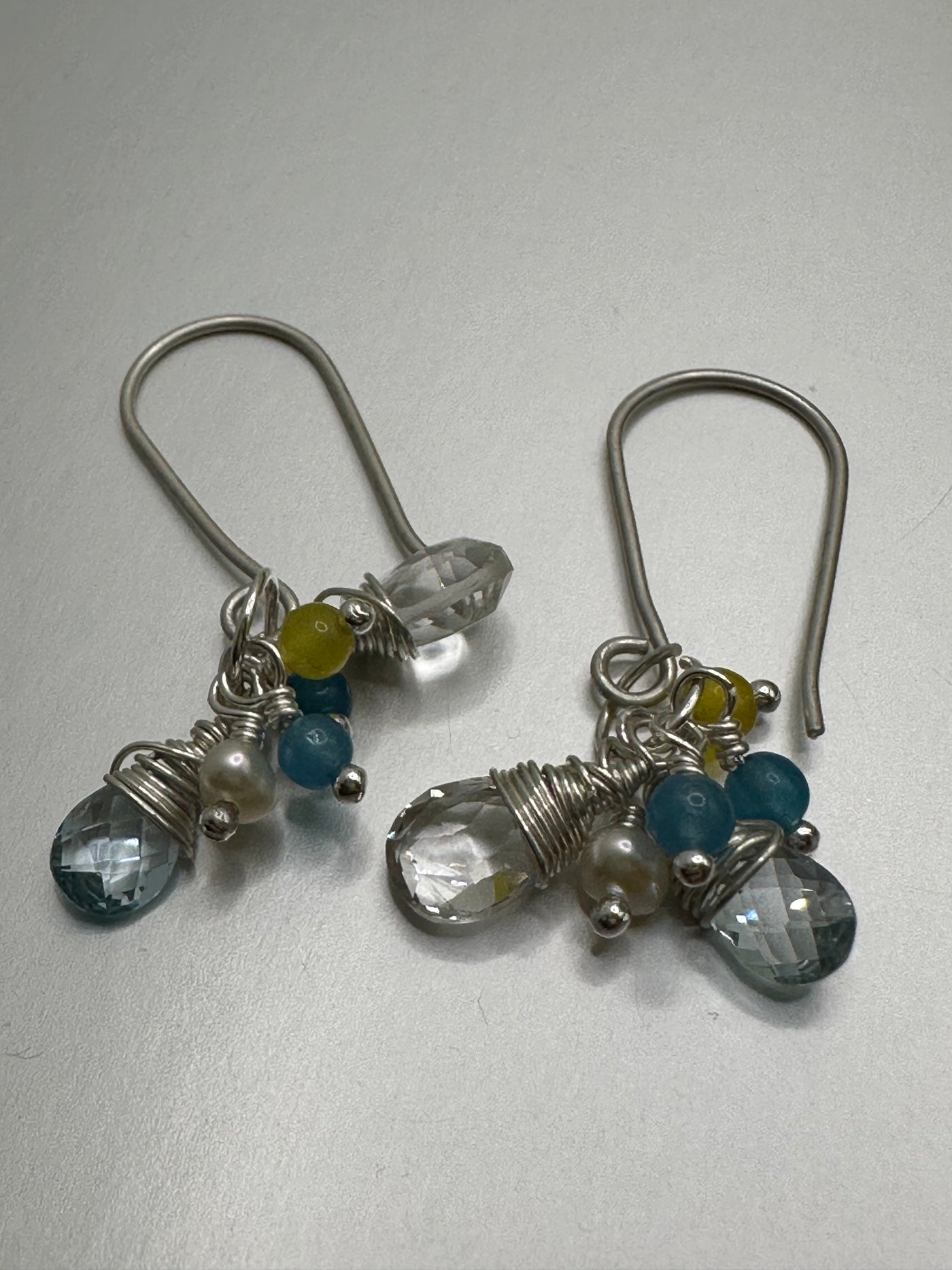 Dangling earrings with quartz briolette, pearls and yellow and blue beads