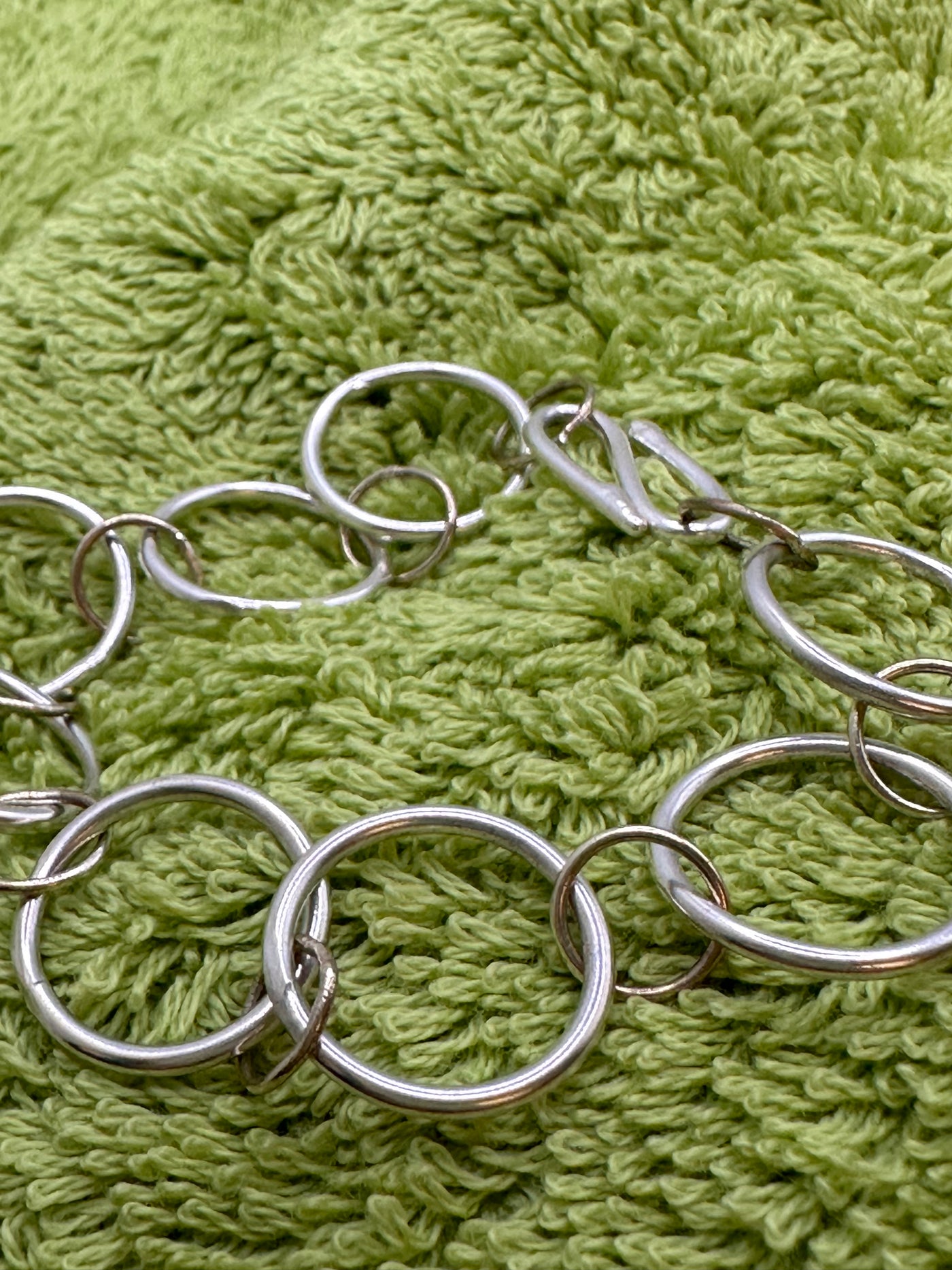 Sterling silver and gold bracelet circles and a linear closure