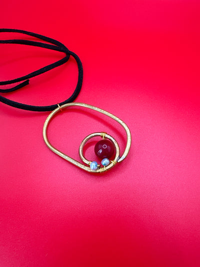 Brass, red bamboo coral and Freshwater pearls pendant on black leather