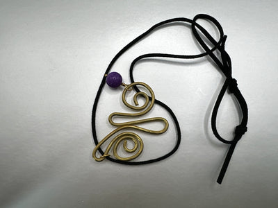 Brass, violet jade pendant on black leather