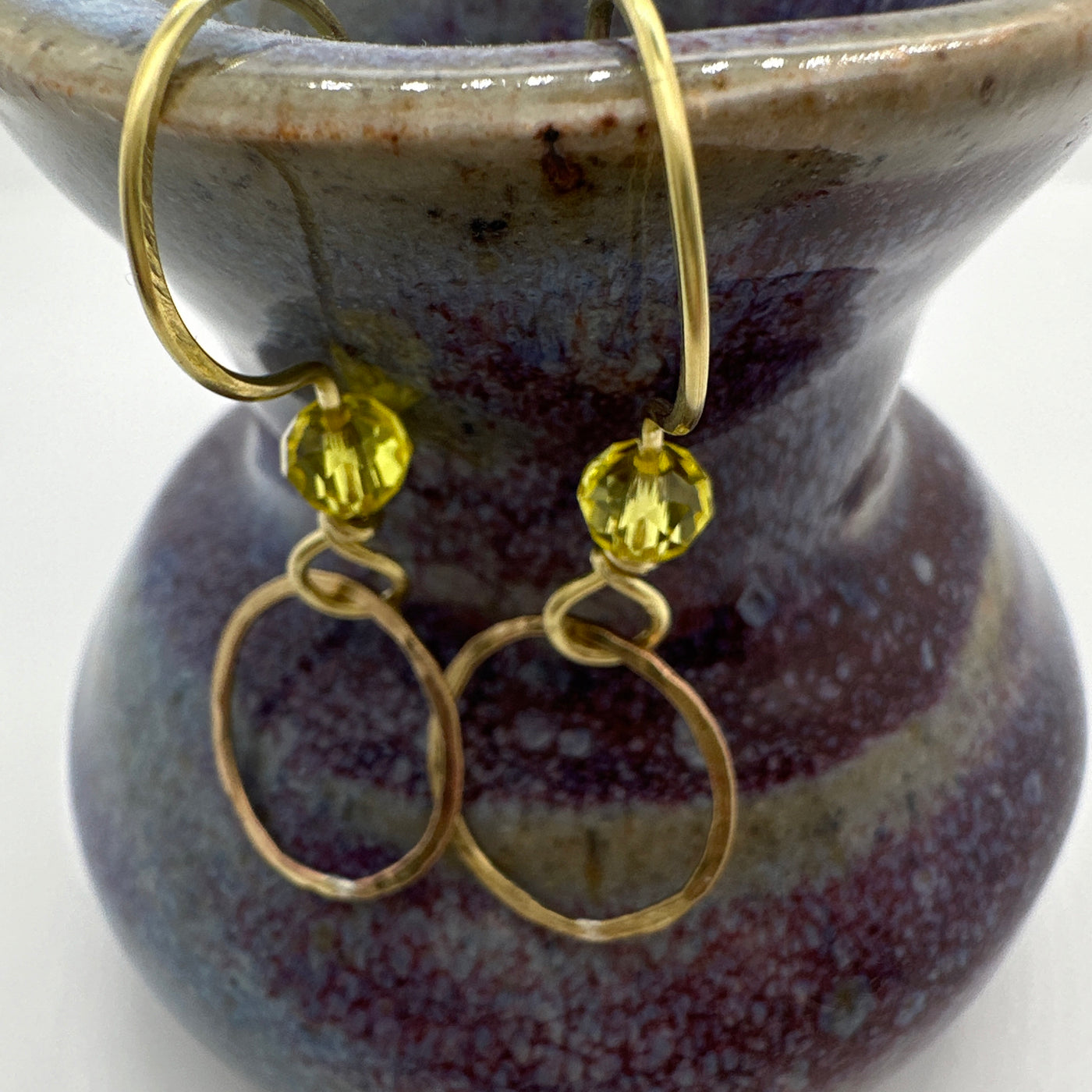 Brass handmade circle and yellow crystal on brass earrings