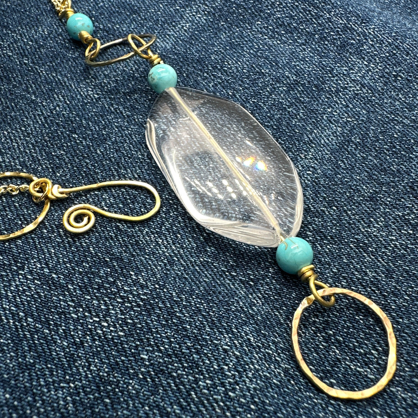 Brass handmade circle, transparent glass and yellow crystals on brass chain