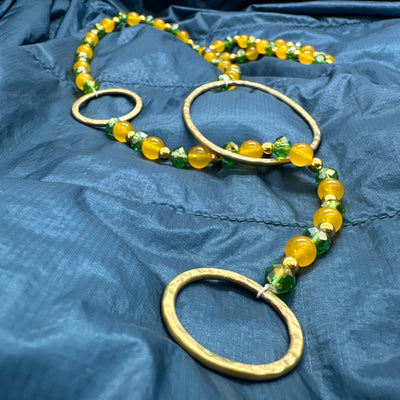 Scarf necklace with brass circles, citrine and green crystal rondelles beads