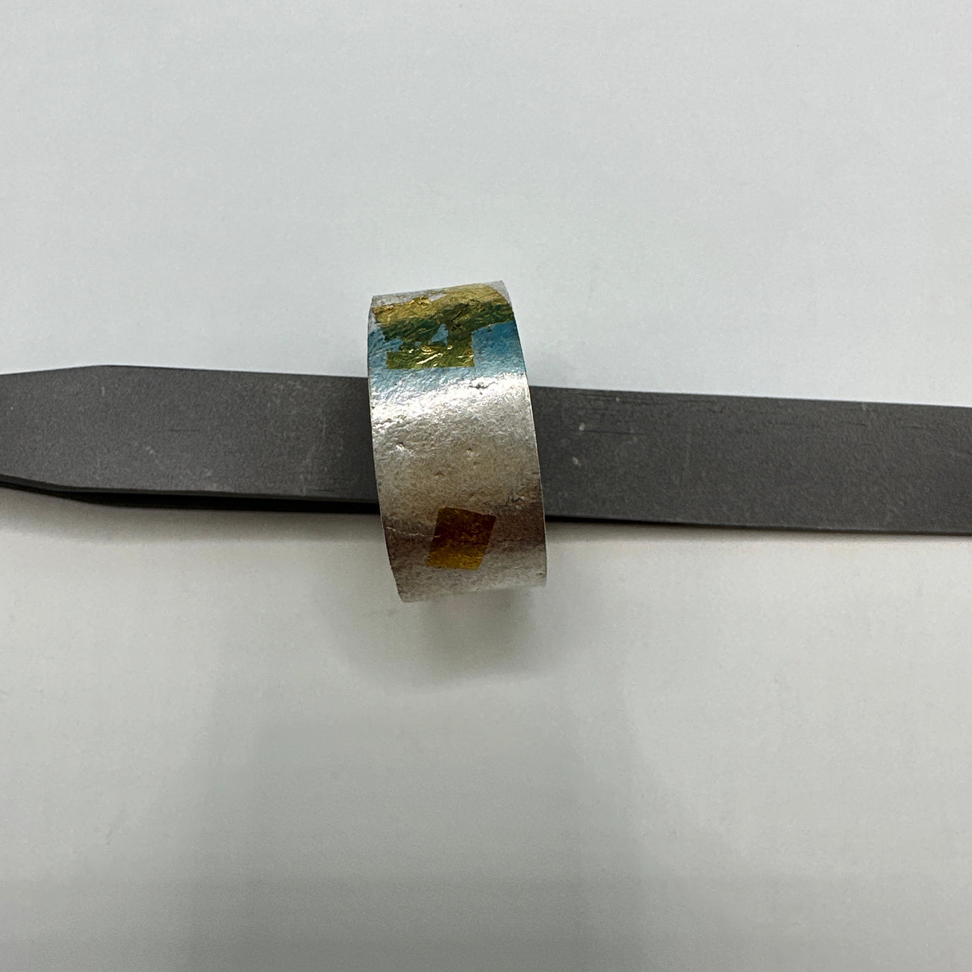 Reticulation and Keumboo technique for this silver sterling and gold ring band