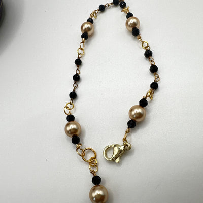 Bracelet silver 925 and black beads with golden pearls