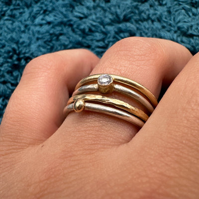 4 stackable rings in gold 9 k  and silver