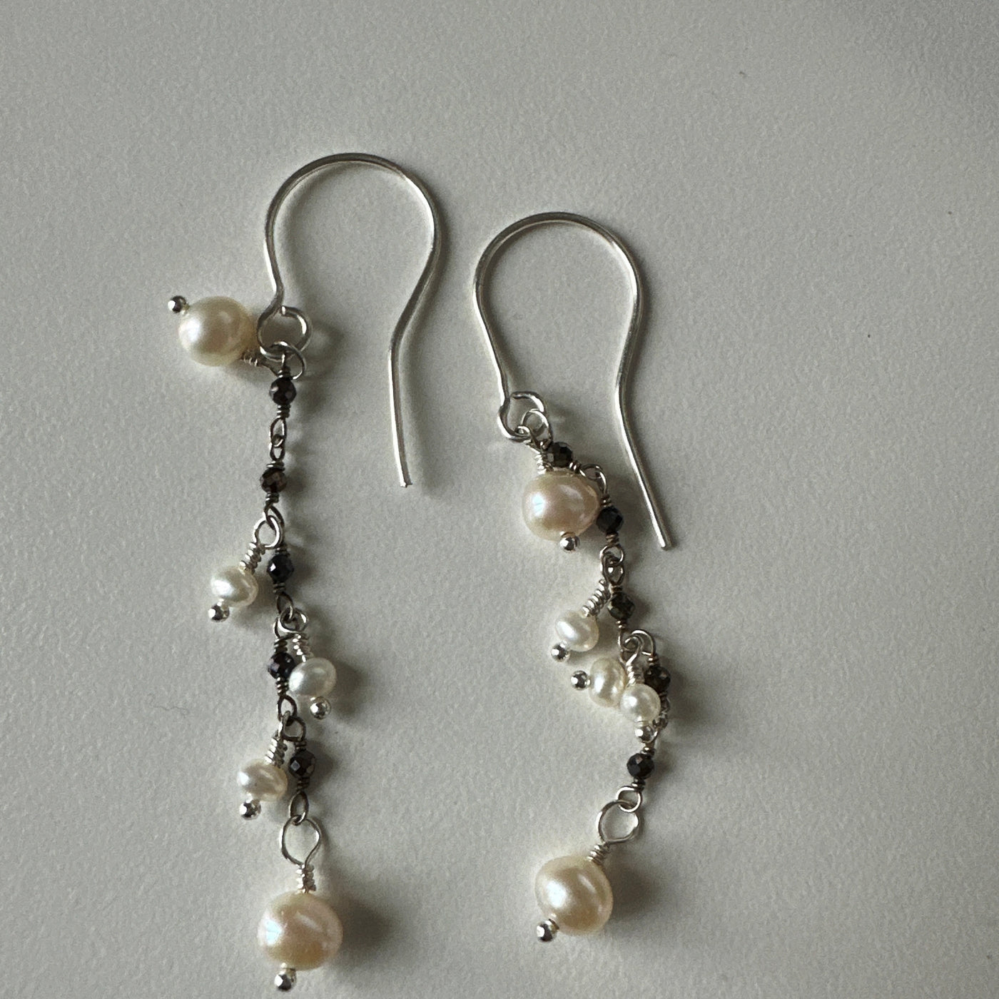Freshwater oval and potato pearls on silver earrings