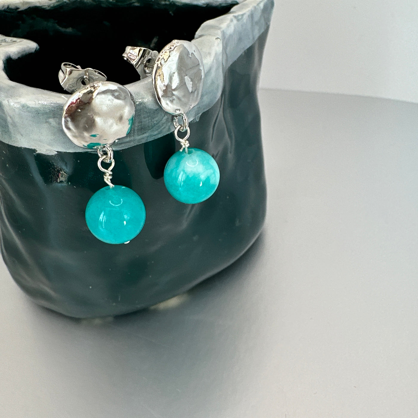 Brass earrings with aqua giada pearls