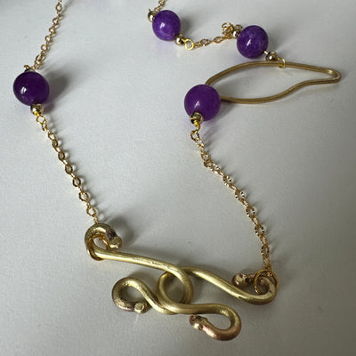 Bronze oval and brass chain with purple giade and steel dividers