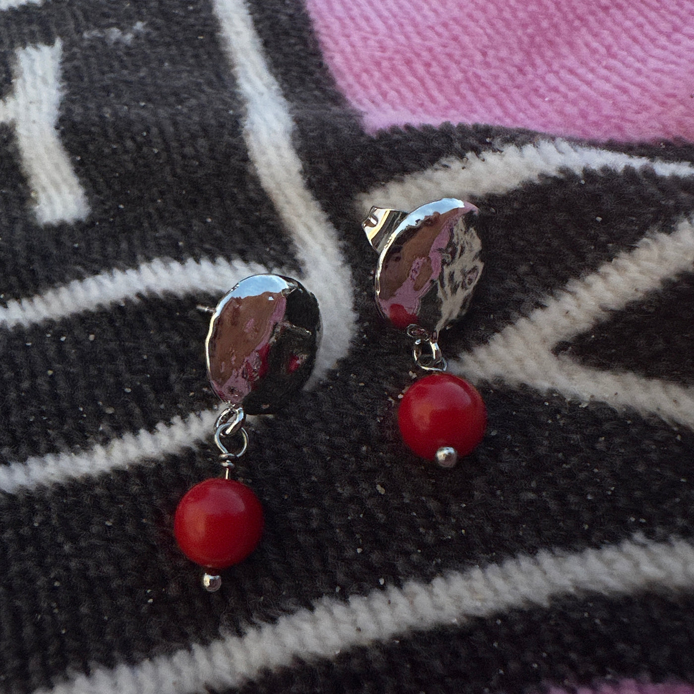 Red giada earrings with round silver colored brass elements