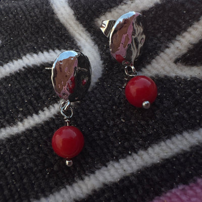 Red giada earrings with round silver colored brass elements