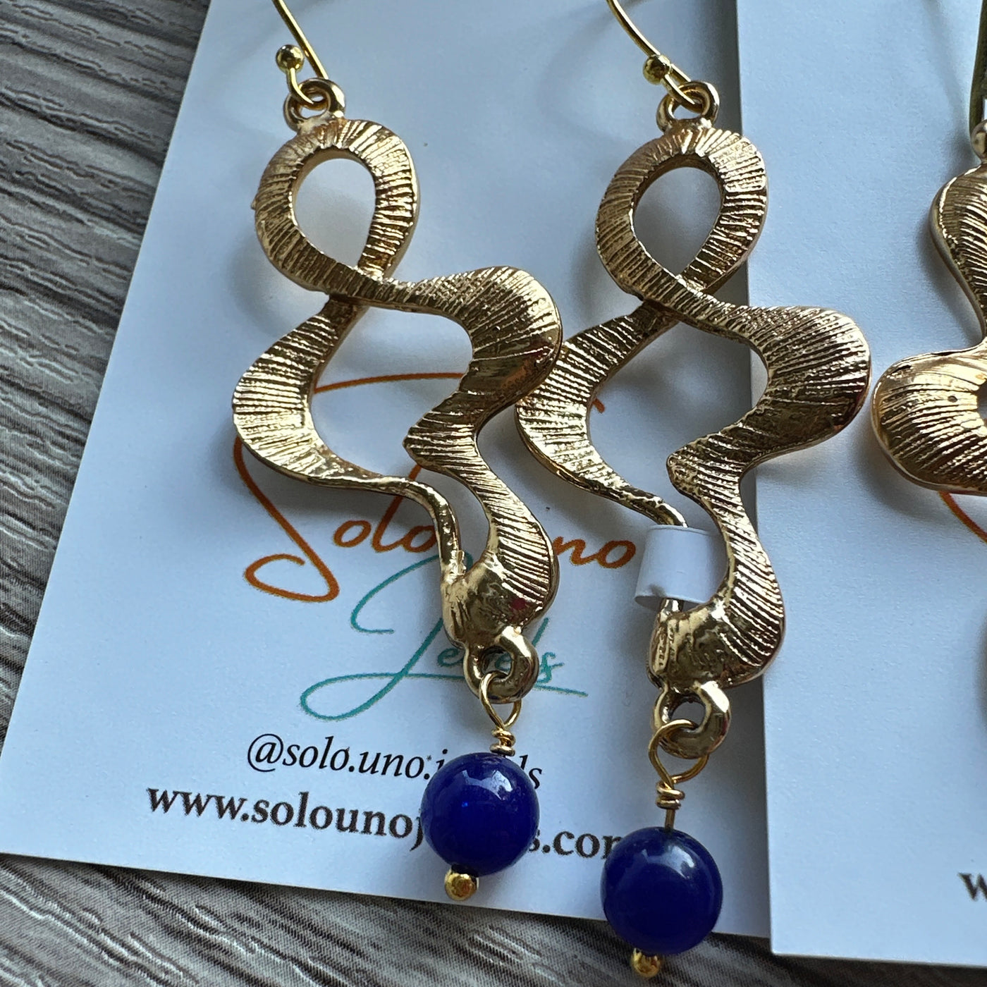 Blue giada pearls earrings with  gold colored zama elements and brass