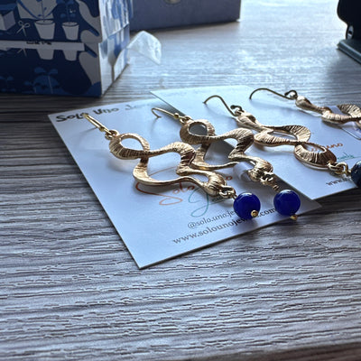 Blue giada pearls earrings with  gold colored zama elements and brass