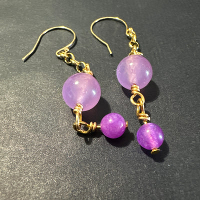 Small and larger purple giada beads on brass earrings