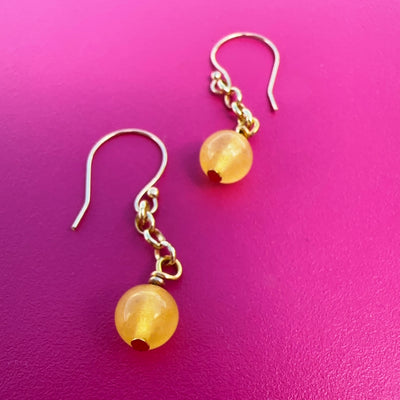 Yellow giada earrings with brass chain