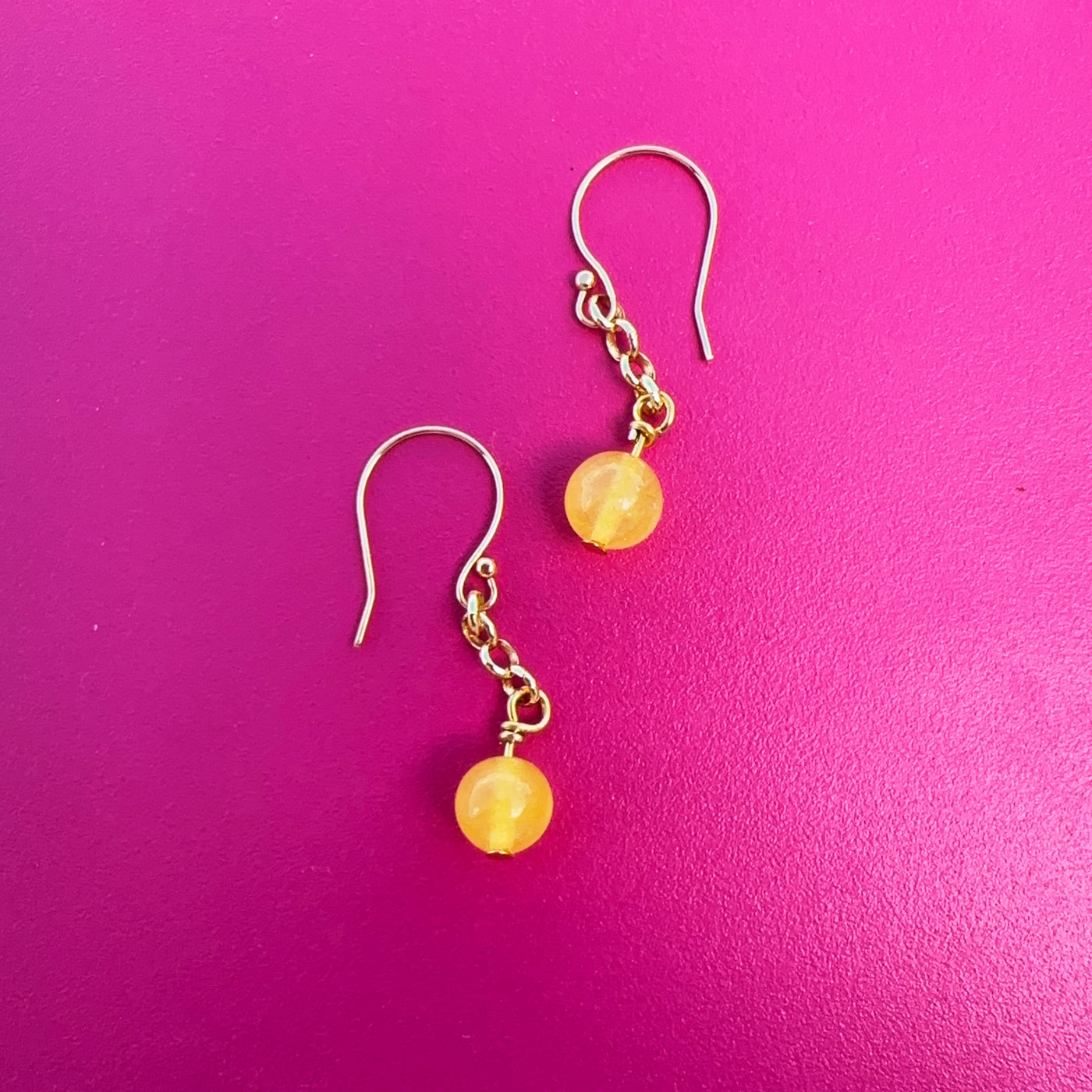 Yellow giada earrings with brass chain