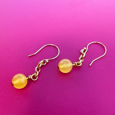 Yellow giada earrings with brass chain