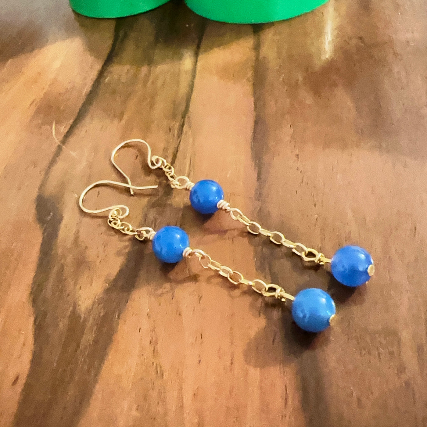 Blue giada pearls earrings with brass chain