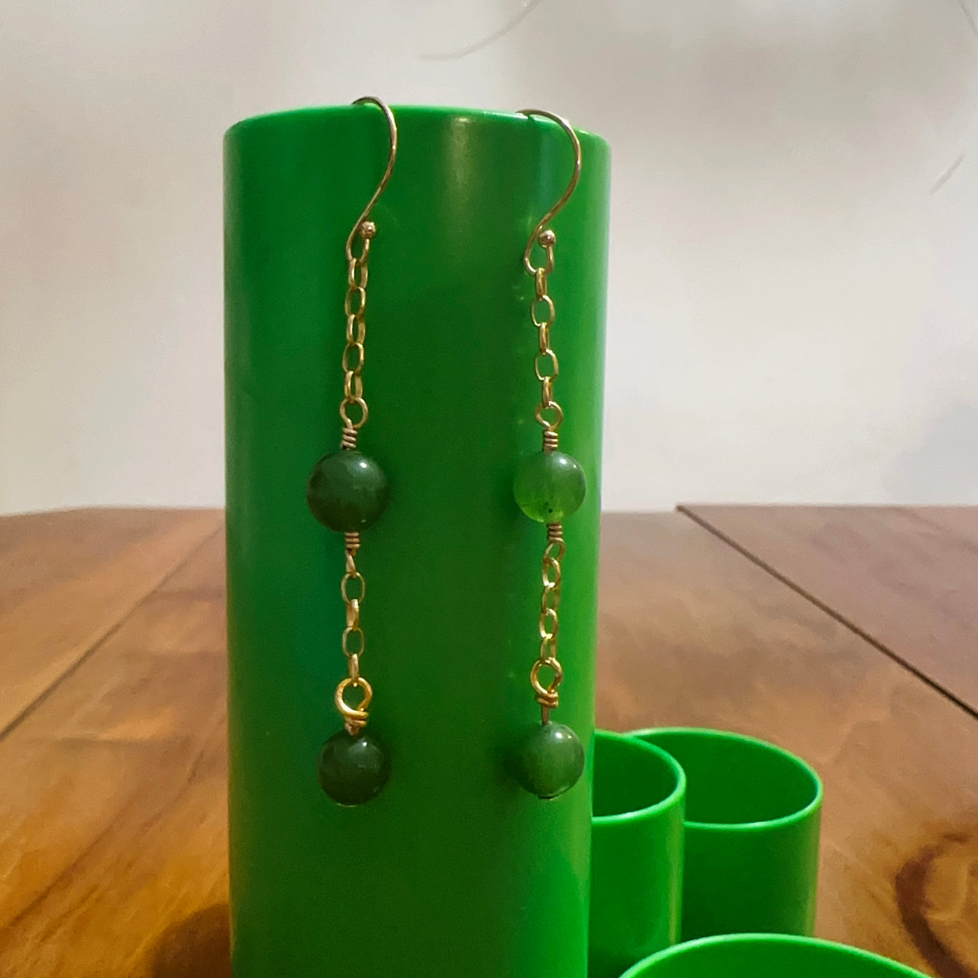 Green giada pearls earrings with brass chain