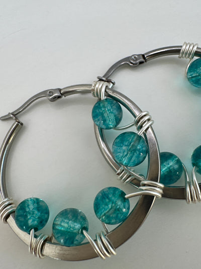 Rock Christal earrings on round plate steel circle 