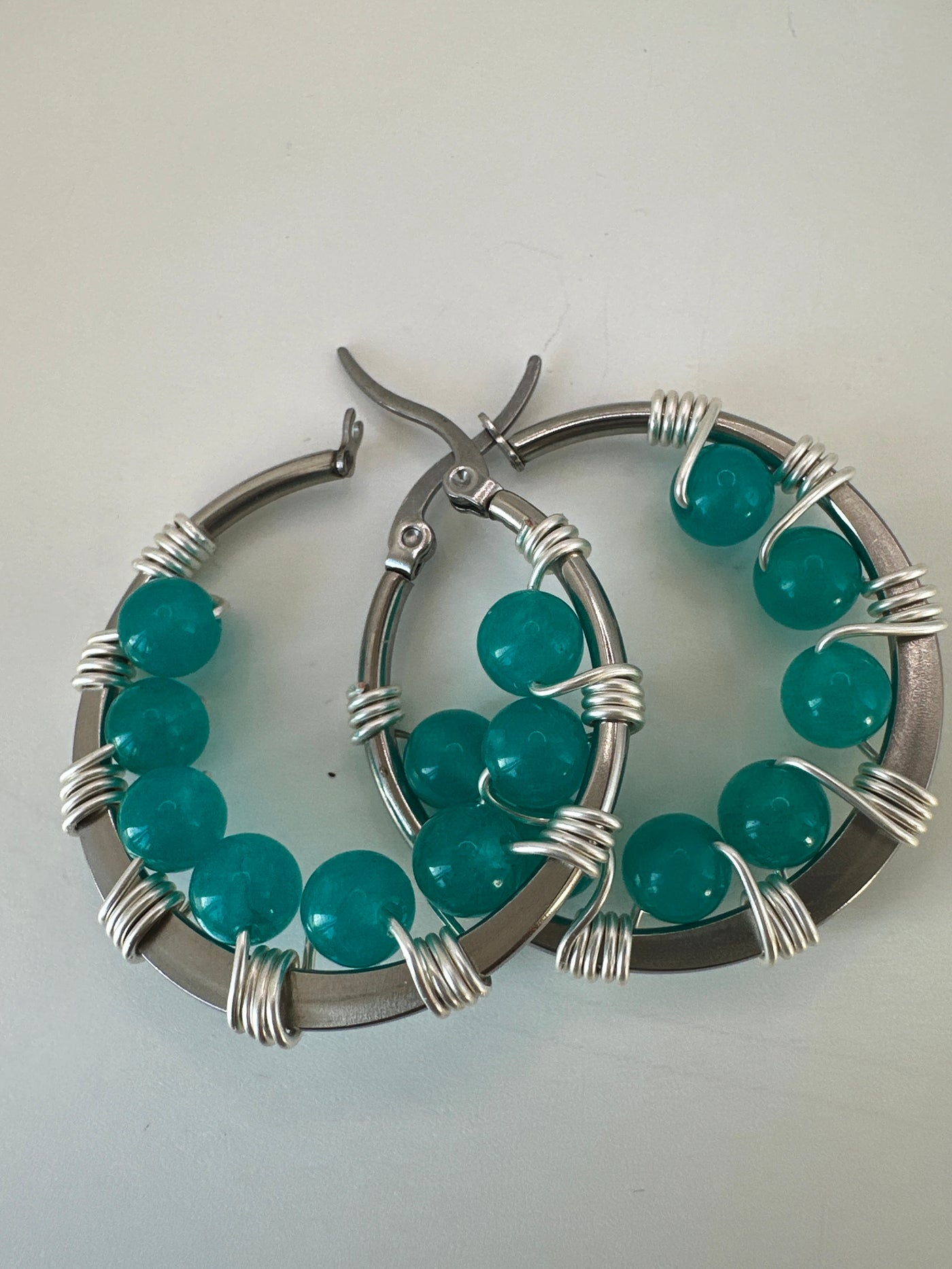 Turquoise giade earrings on round plate steel circle 