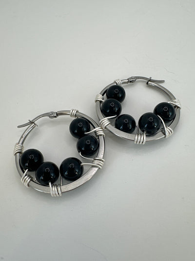 Onyx earrings on round plate steel circle