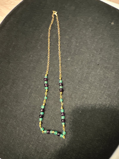 Amethysts, light green glass necklace on steel chain 'forzatina' gold plated