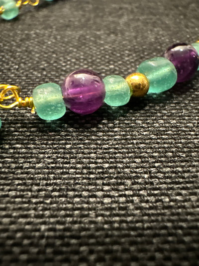 Amethysts, light green glass necklace on steel chain 'forzatina' gold plated