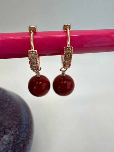 Bronze small circle earrings with coral paste pearls and zircons