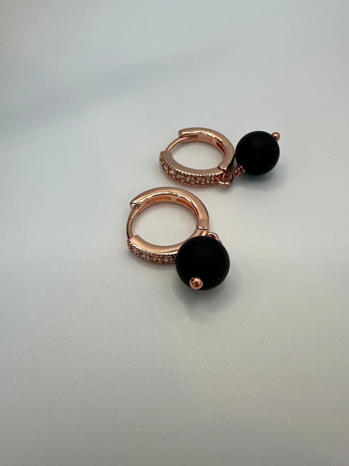 Bronze small circle earrings with onice and zircons