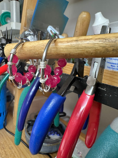 Pink jade earrings on round plate steel circle 