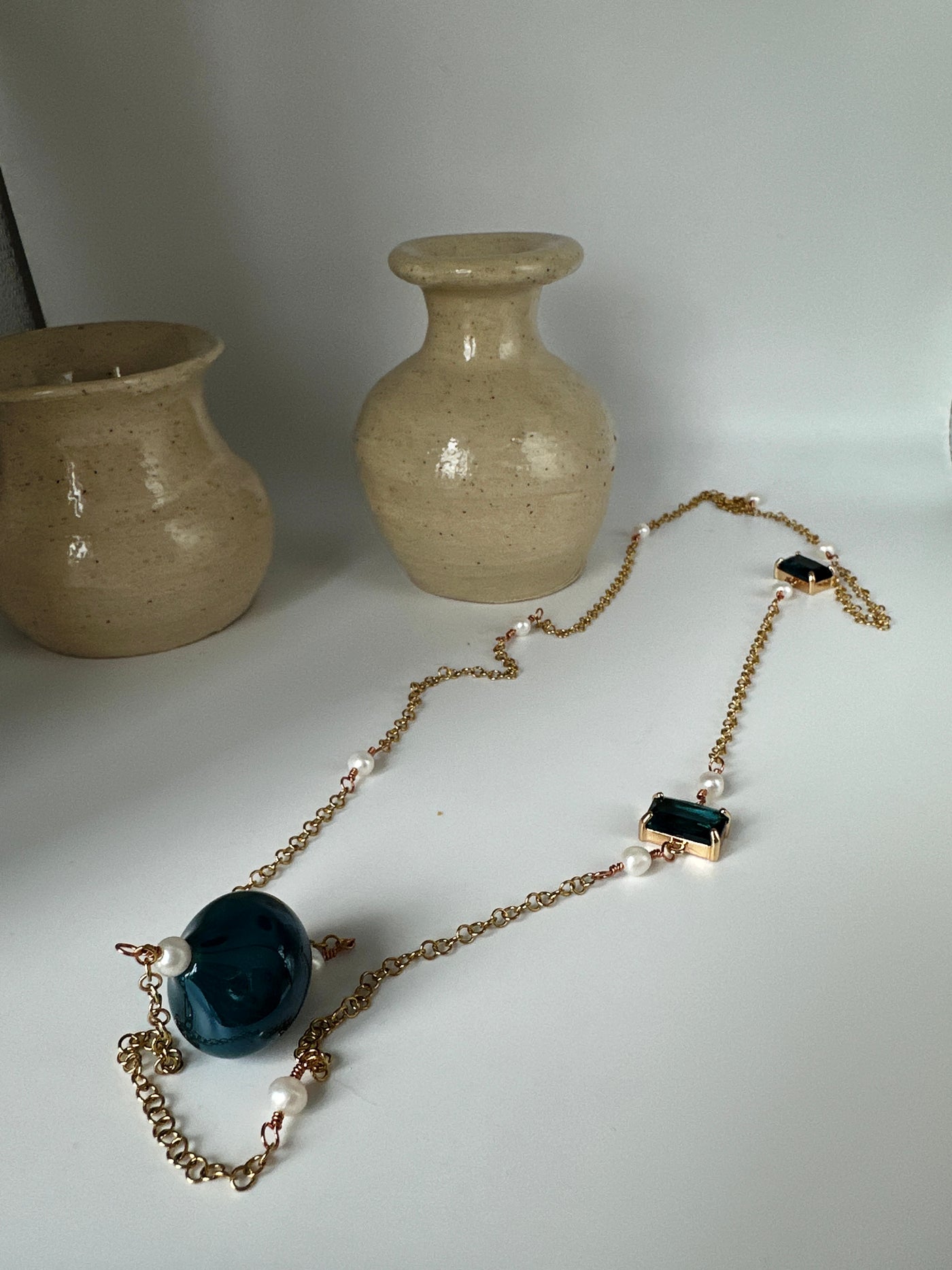 Forzatina steel chain (gold color) with white pearls and blue glass beads - long 84 cm