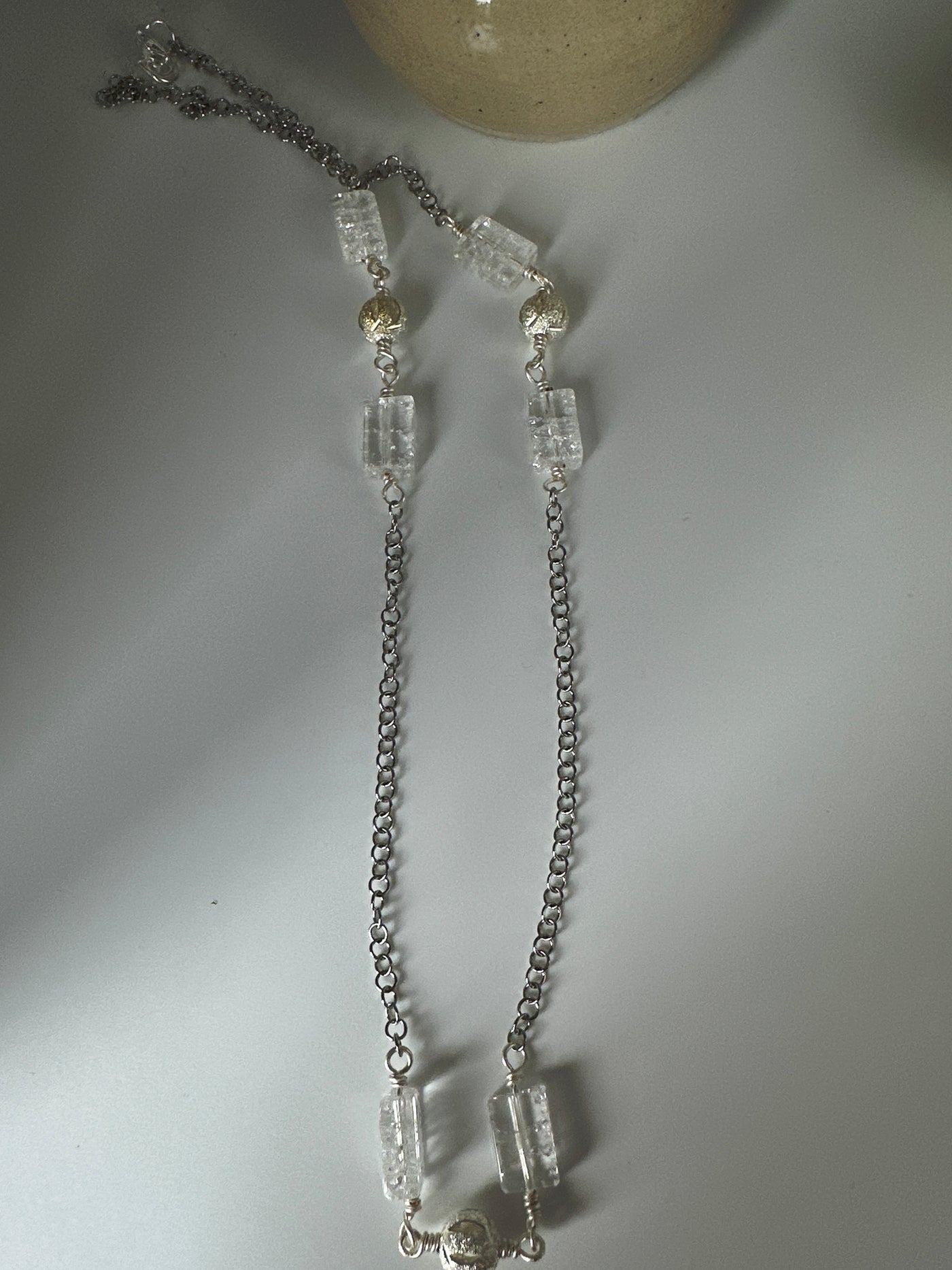 Rectangular Crystal rock and elements of diamanted brass on steel forzatina - long 50 cm