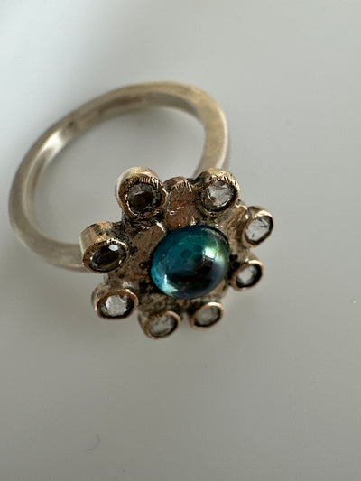 Irregular silver flower ring with cubic zirconias and galazio blue topaz 6 mm, ring size O/P