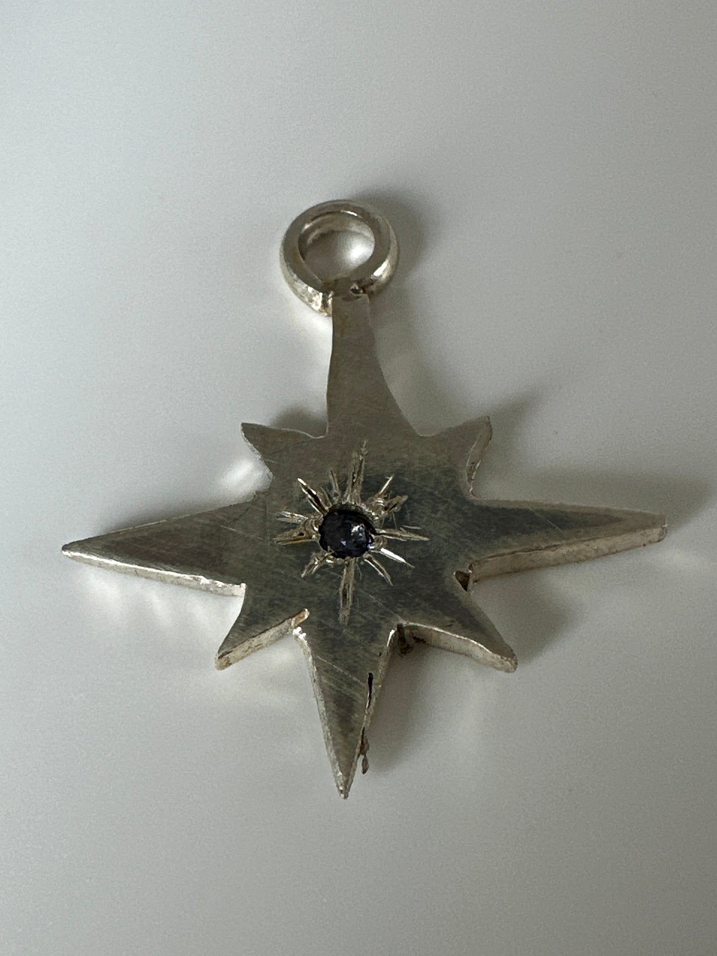 Silver pendant star with amethyst on forzatina steel chain