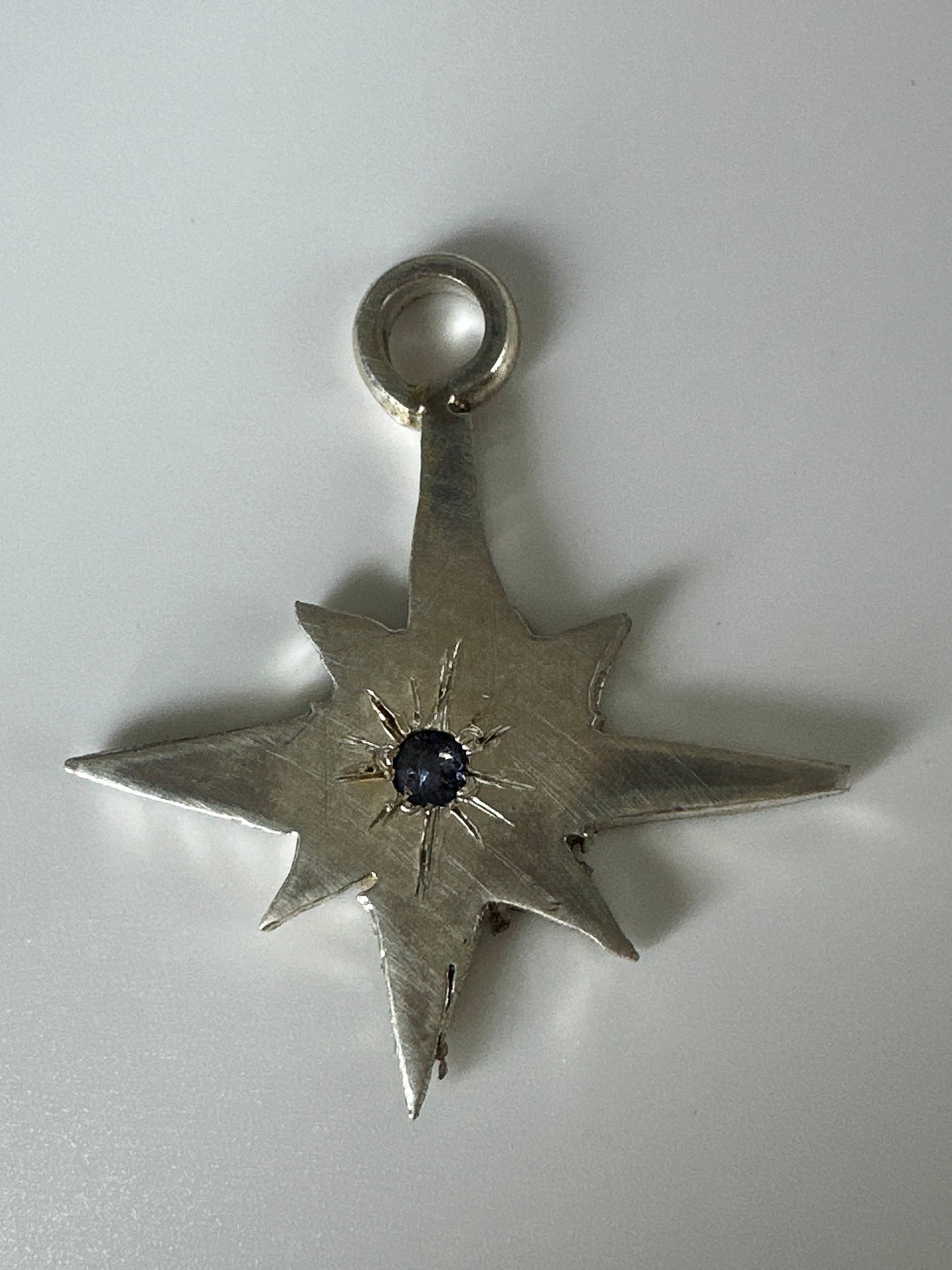 Silver pendant star with amethyst on forzatina steel chain
