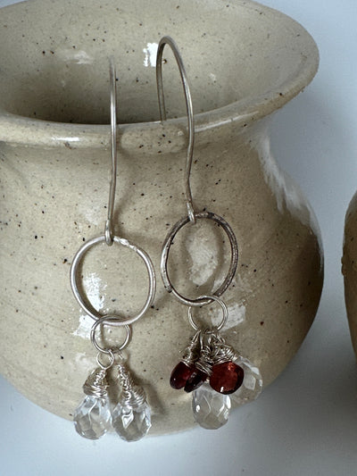 A-symmetric silver earrings with pear shaped crystals