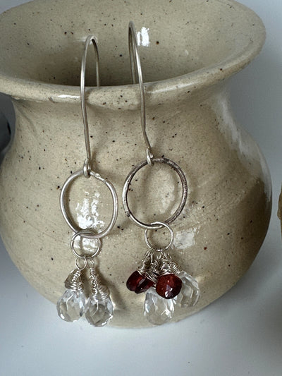 A-symmetric silver earrings with pear shaped crystals